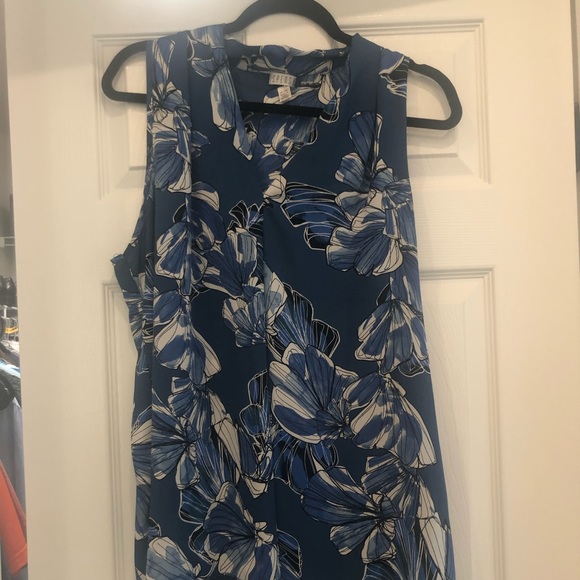 Flowy sleeveless blouse in blue - Picture 1 of 5